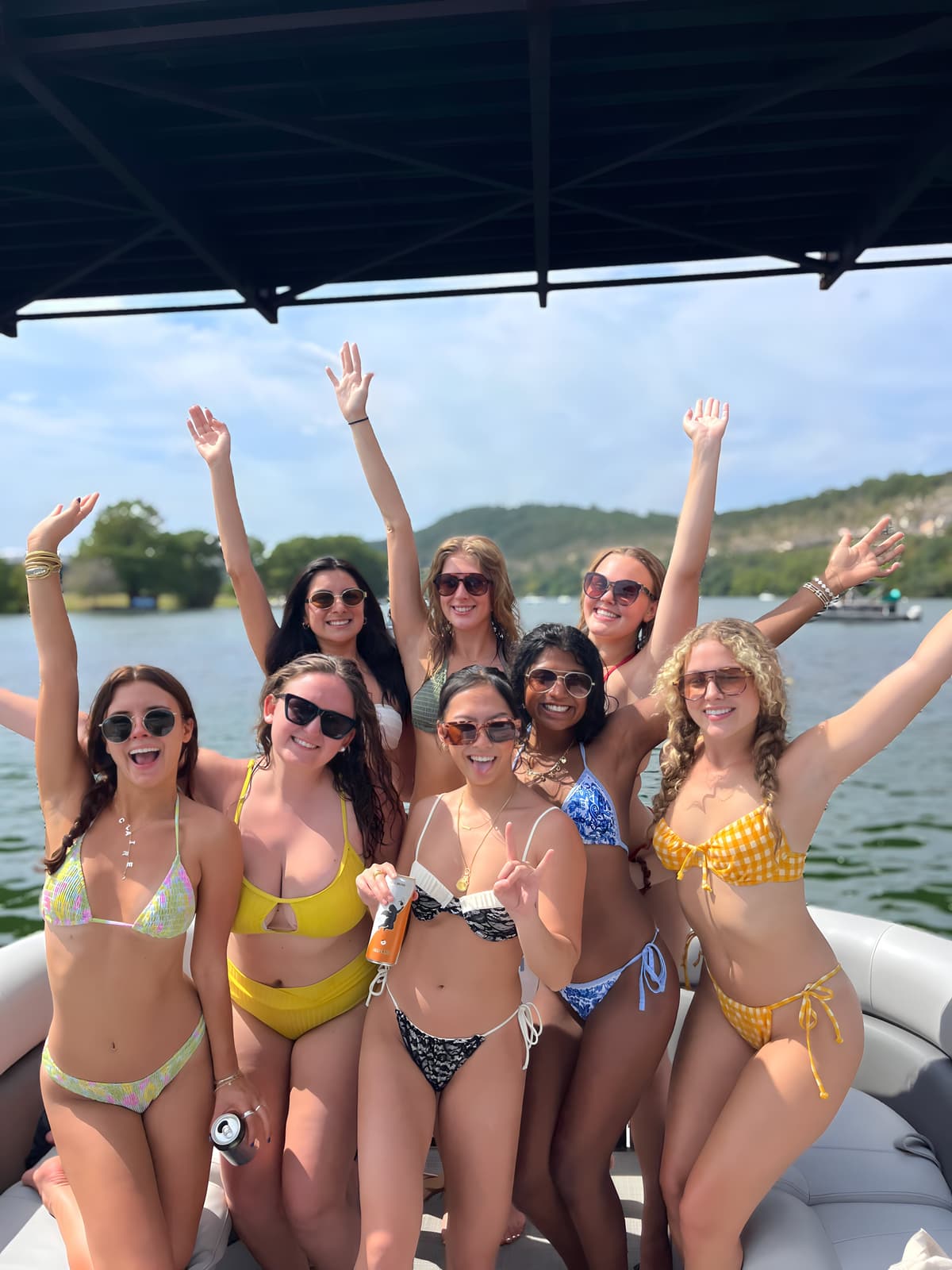 Bachelorette party group celebrating on Lake Austin party boat