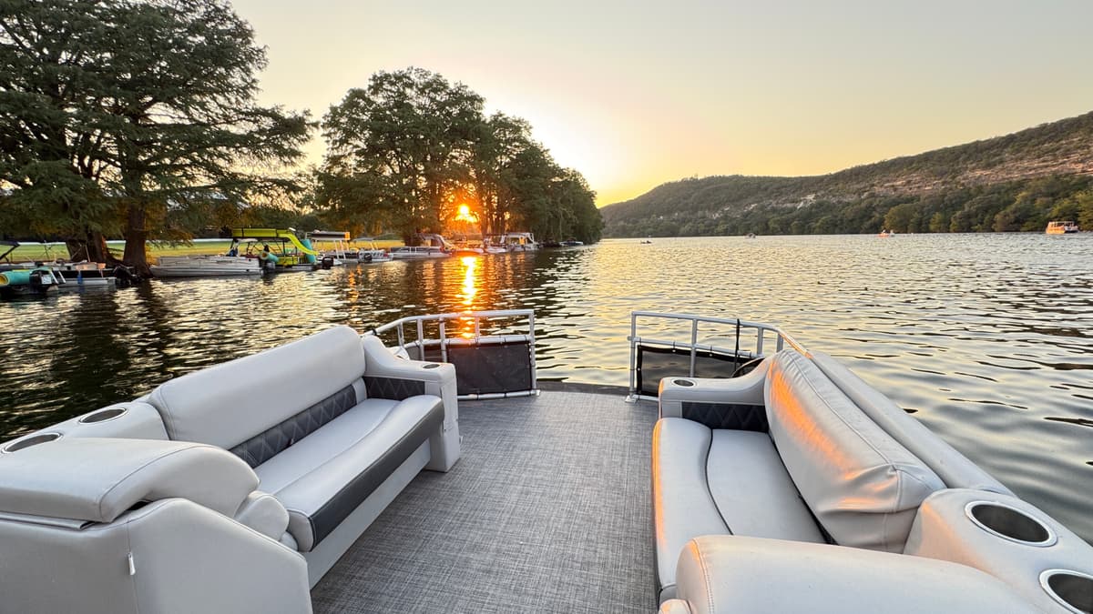 BOATX boat on Lake Travis at sunset