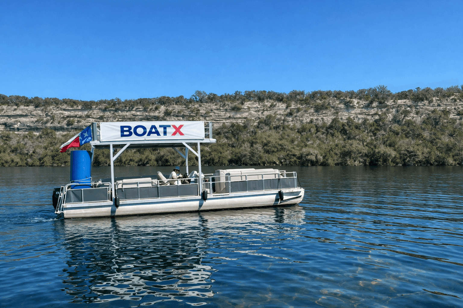 Guest enjoying the water on BOATX pontoon boat