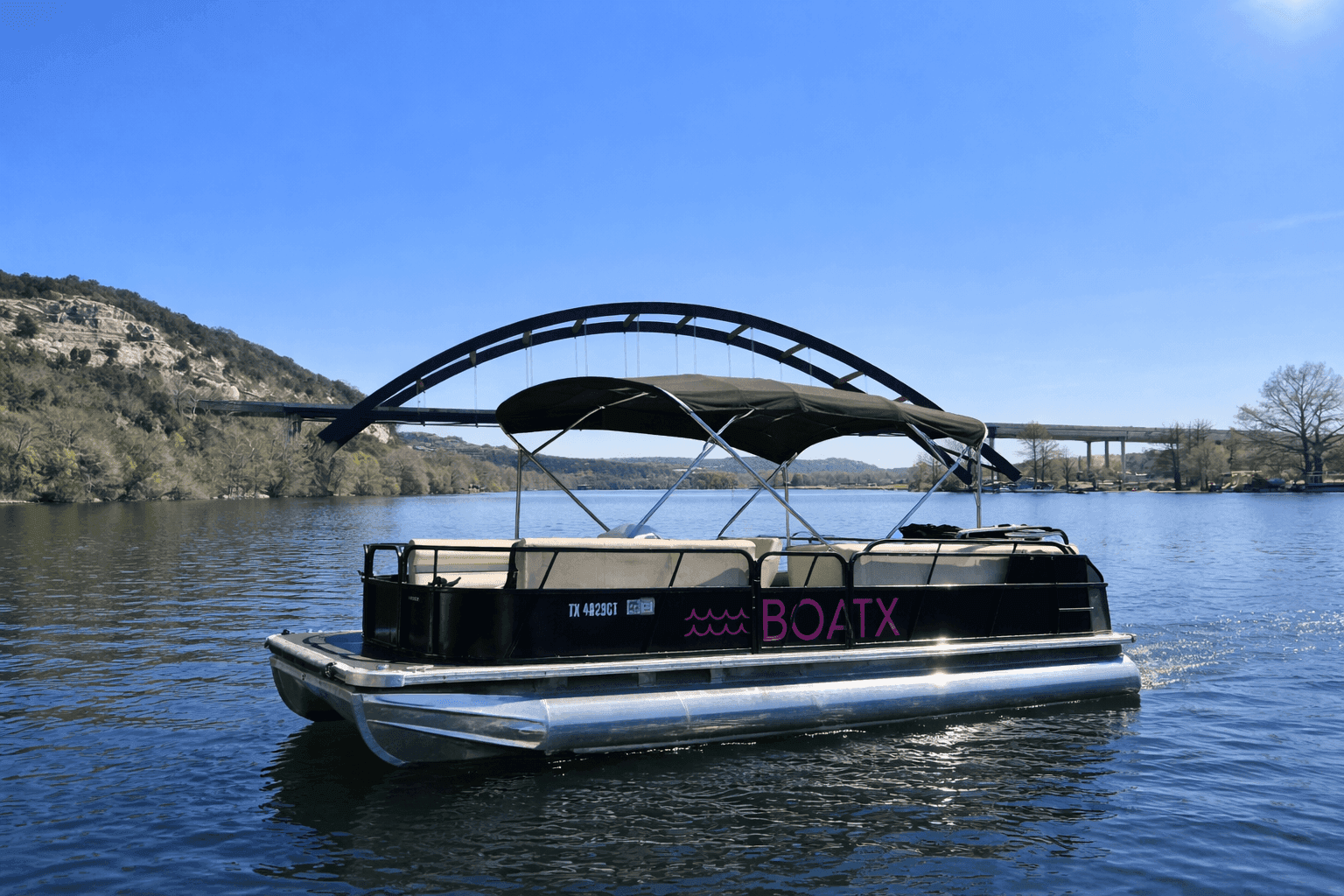 BOATX Luxury Pontoon Boat at sunset on Lake Austin